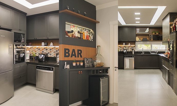 Fotografia ilustrativa de uma cozinha preta com bar - Dia do arquiteto